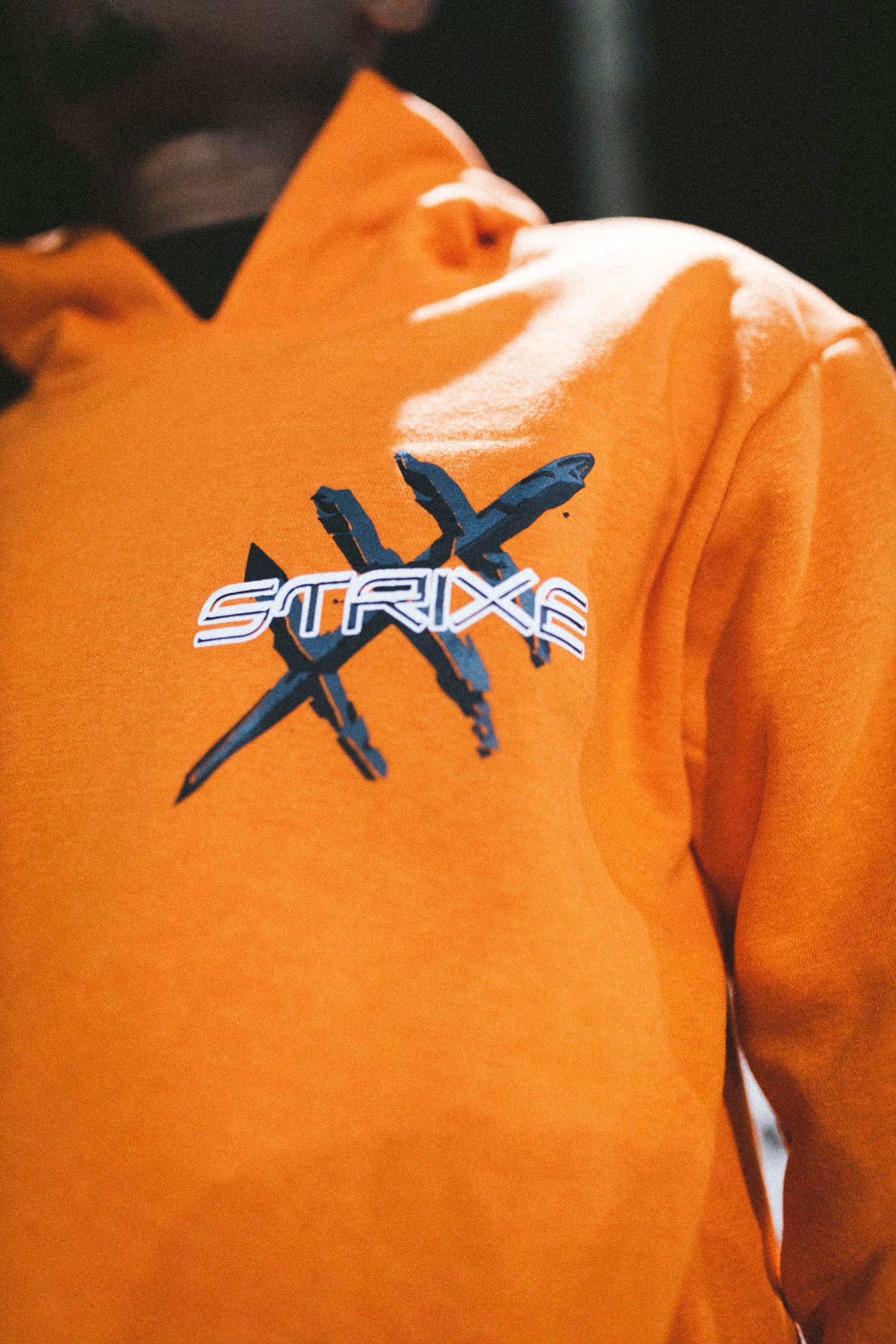 Strixe Street Style FSHN orange hoodie